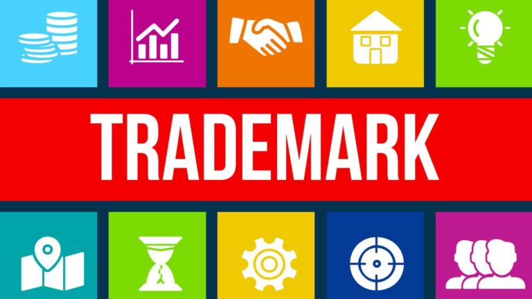 The word trademark on a colorful background, representing the expertise in marketing management.