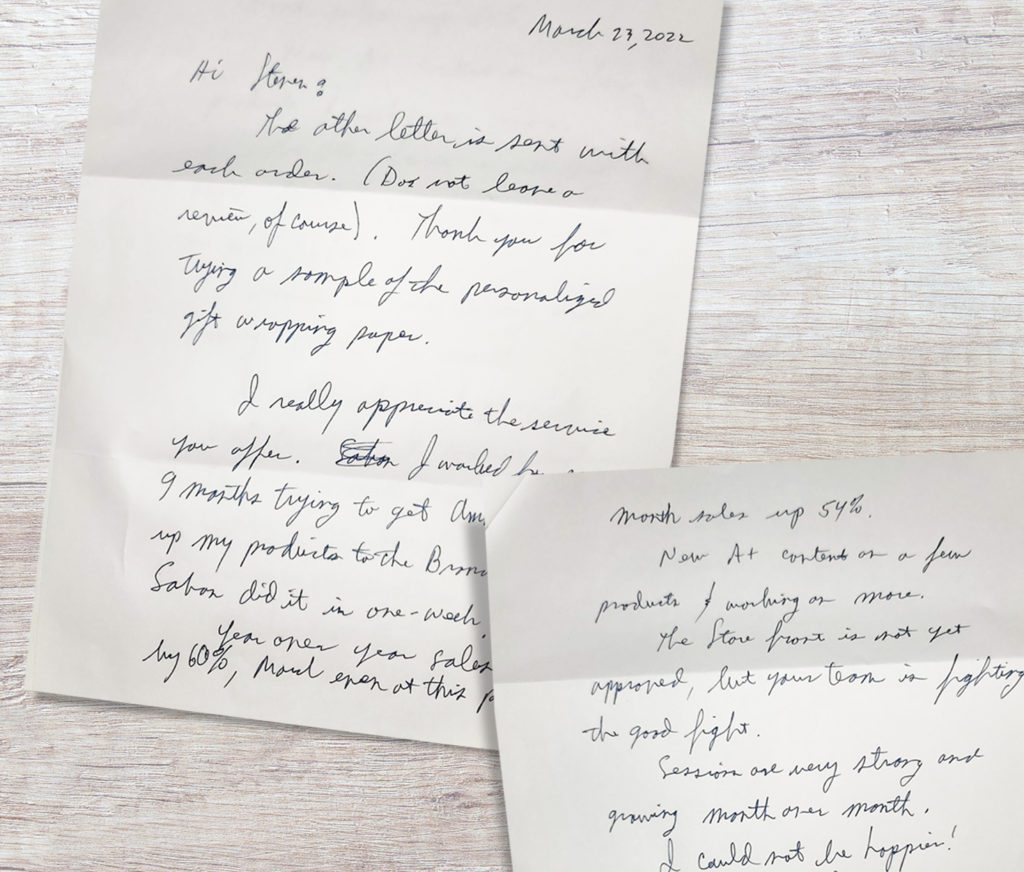 Two pieces of paper with handwriting on them, available for sale on Amazon's marketplace.